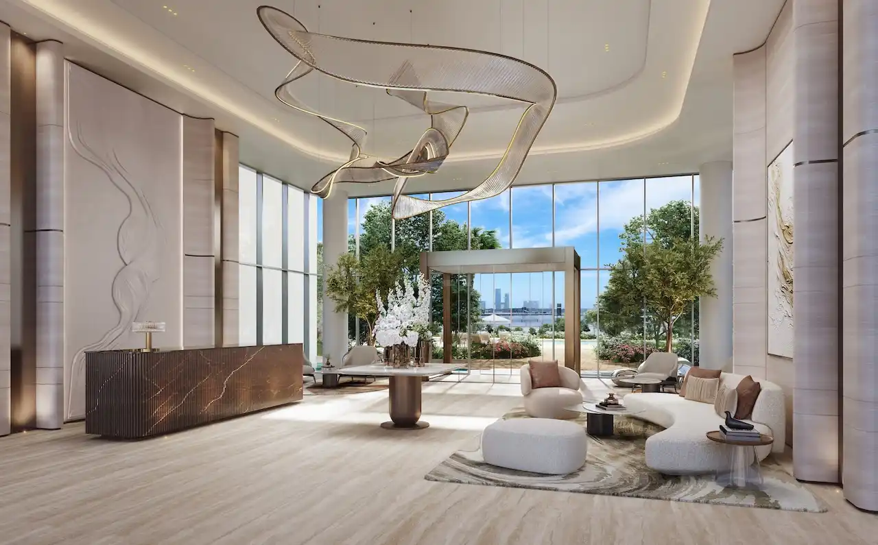 Elegant double-height lobby with sculptural chandelier, refined seating areas, and floor-to-ceiling windows at The Edit at d3 in Dubai Design District, Presented by Tohid Fetrat