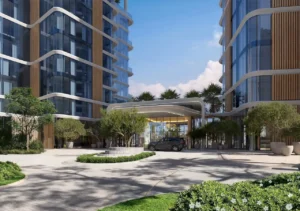 Main entrance and drop-off area with contemporary architecture, landscaped driveway, and glass façade at The Edit at d3 in Dubai Design District, Presented by Tohid Fetrat