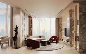 Luxury duplex living room interior at The Symphony Tower by Imtiaz featuring floor-to-ceiling windows, sculptural lighting, refined seating, marble accents, and contemporary elegance in Dubai, Presented by Tohid Fetrat