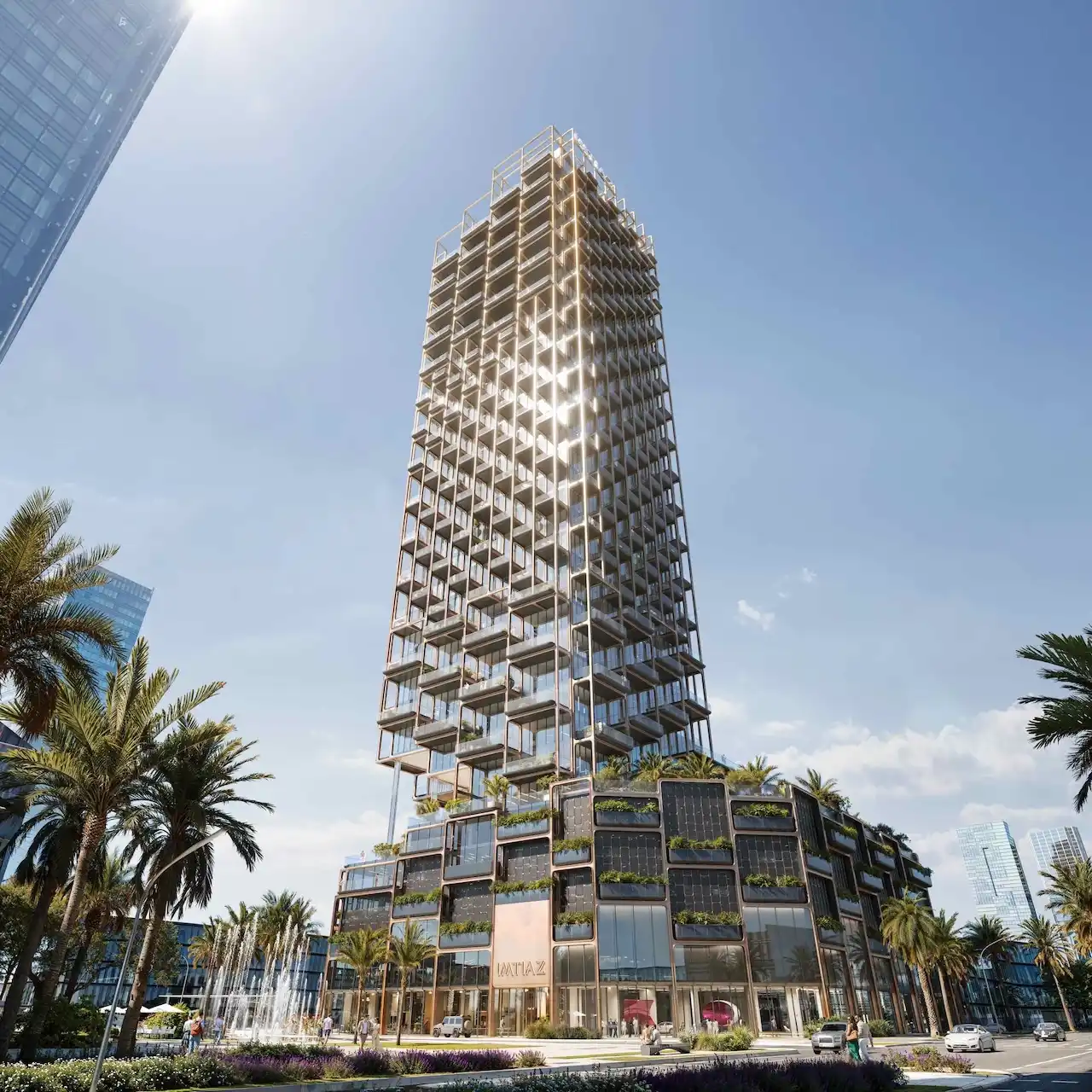 The Symphony Tower by Imtiaz exterior daytime view, featuring a contemporary high-rise with geometric balconies, palm-lined podium, and modern urban surroundings in Dubai, Presented by Tohid Fetrat