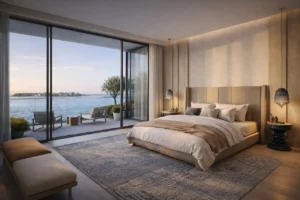 Bay Estate villas primary bedroom at Island E by Nakheel with sea view terrace and modern interior Presented by Tohid Fetrat AI generated concept