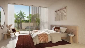 Bay Villas Garden Villa master bedroom with garden view, natural daylight, wooden details and balcony access in Island B Dubai Islands by Nakheel, Presented by Tohid Fetrat