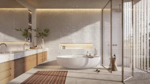 Bay Villas Garden Villa primary bathroom with freestanding bathtub, natural stone finishes and spa style shower in Island B Dubai Islands by Nakheel, Presented by Tohid Fetrat