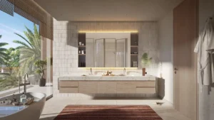Bay Villas Garden Villa primary bathroom with double vanity, freestanding bathtub, natural stone textures and garden view in Island B Dubai Islands by Nakheel, Presented by Tohid Fetrat