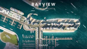 Top-down branded site plan render of Bayview by Address Resorts at Emaar Beachfront, illustrating beachfront towers, private beach frontage, marina docks, and surrounding Gulf waters in Dubai, Presented by Tohid Fetrat