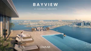 Sky deck infinity pool render of Bayview by Address Resorts at Emaar Beachfront, featuring panoramic sea views, private sun loungers, luxury terrace seating, and elevated waterfront living overlooking the Gulf, Presented by Tohid Fetrat