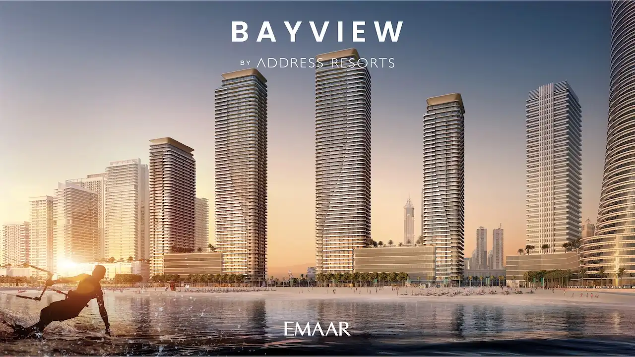 Sunrise beachfront view of Bayview by Address Resorts at Emaar Beachfront, showcasing iconic waterfront towers, sandy shoreline, active beach lifestyle, and panoramic Dubai skyline views along the Gulf, Presented by Tohid Fetrat