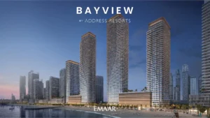 Waterfront exterior render of Bayview by Address Resorts at Emaar Beachfront, showcasing elegant high-rise towers, illuminated architectural lines, seaside promenade, and luxury beachfront living overlooking the Gulf, Presented by Tohid Fetrat