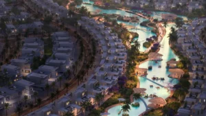 Barbados at DAMAC Islands 2 lagoon community aerial view with waterfront villas and leisure islands Dubai Presented by Tohid Fetrat