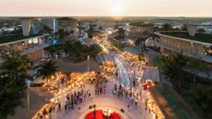Bermuda at DAMAC Islands 2 community market plaza with outdoor retail stalls and social gathering spaces community setting Dubai Presented by Tohid Fetrat
