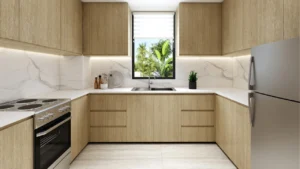 Modern kitchen interior in Bermuda at DAMAC Islands 2 twin villa featuring minimalist cabinetry marble backsplash and functional family living layout Dubai Presented by Tohid Fetrat