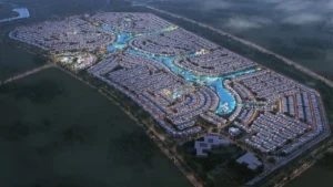 Cuba at DAMAC Islands 2 evening aerial master plan showing illuminated lagoons and villa community layout Dubai Presented by Tohid Fetrat