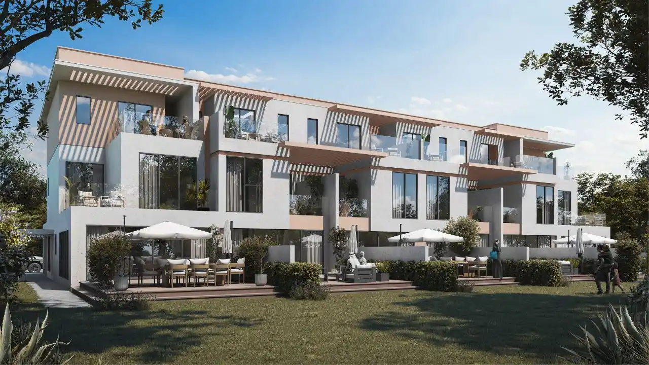 Luxury marble master bathroom inside Maui at DAMAC Islands 2 villa featuring freestanding bathtub, double vanity and premium finishes Presented by Tohid Fetrat