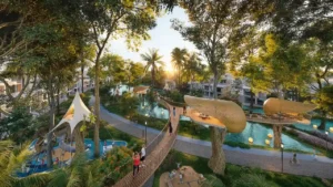 Maui at DAMAC Islands 2 park bridge leisure area with landscaped gardens walking paths and villa community surroundings Dubai Presented by Tohid Fetrat