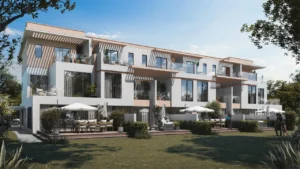 Modern townhouse residences at Tahiti DAMAC Islands 2 with private garden terraces outdoor seating areas and contemporary island community design in Dubai Presented by Tohid Fetrat