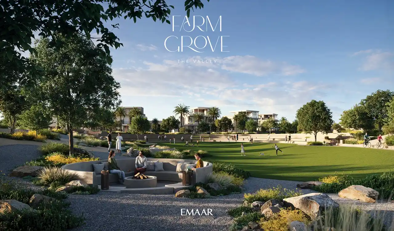 Farm Grove community green lawn with social seating landscaped pathways and open recreational space in The Valley Dubai Presented by Tohid Fetrat