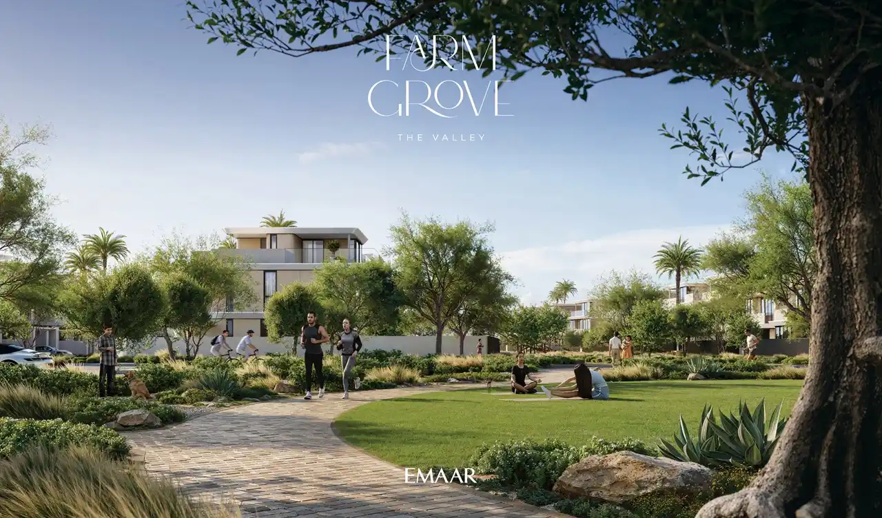 Farm Grove community park with walking paths open green lawns and landscaped trees creating an active outdoor setting in The Valley Dubai Presented by Tohid Fetrat