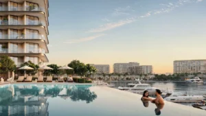 Fior 1 at Rashid Yachts & Marina by Emaar infinity pool overlooking marina with yachts and waterfront residences, Dubai - Presented by Tohid Fetrat