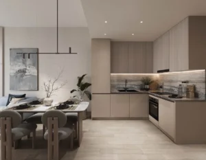 Modern apartment kitchen and dining area at Inara Residence in Dubai featuring minimalist cabinetry, integrated appliances, elegant dining setup, and contemporary interior design, presented by Tohid Fetrat