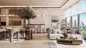 Luxury clubhouse lounge and dining interior at Inara Residence in Dubai featuring open-plan living, designer furniture, natural textures, warm lighting, and panoramic skyline views, presented by Tohid Fetrat
