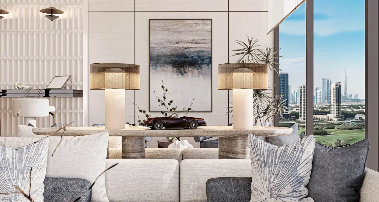 Elegant clubhouse lounge interior at Inara Residence in Dubai featuring refined seating, designer lighting, curated décor, and panoramic skyline views, presented by Tohid Fetrat