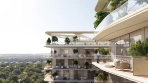 Exterior architectural view of Inara Residence in Dubai, showcasing a contemporary residential façade with modern materials, refined lighting, and landscaped surroundings in an urban setting, presented by Tohid Fetrat