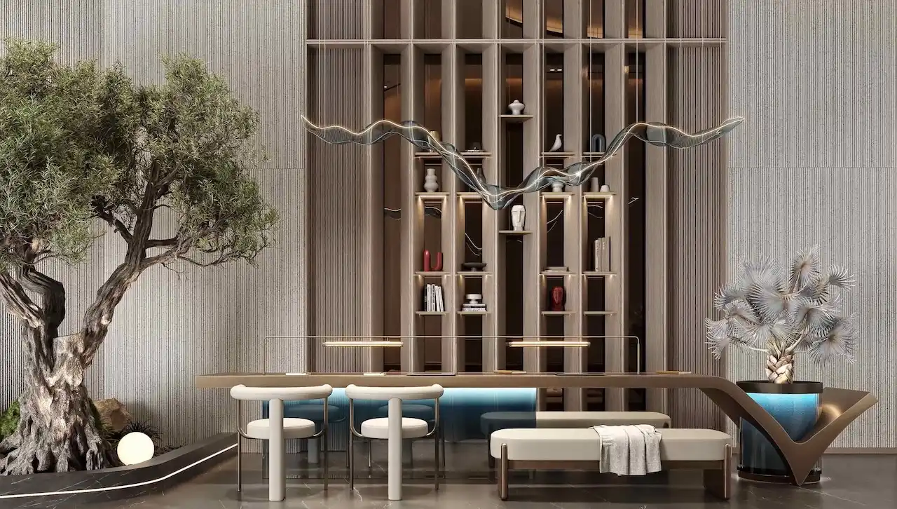 Elegant lobby interior at Inara Residence in Dubai featuring sculptural lighting, curated shelving, natural textures, and refined seating areas designed for a premium residential arrival experience, presented by Tohid Fetrat