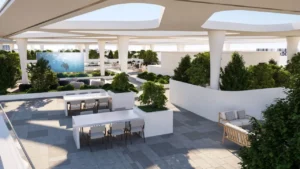 Rooftop terrace exterior of Inara Residence in Dubai featuring shaded outdoor dining tables, landscaped greenery, modern seating areas, sculptural columns, and an open-air lounge environment, presented by Tohid Fetrat