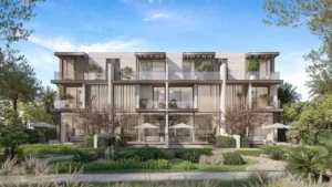 Three bedroom townhouse facade at Nad Al Sheba Gardens Phase 11 with private garden, terrace seating and contemporary architectural design Presented by Tohid Fetrat