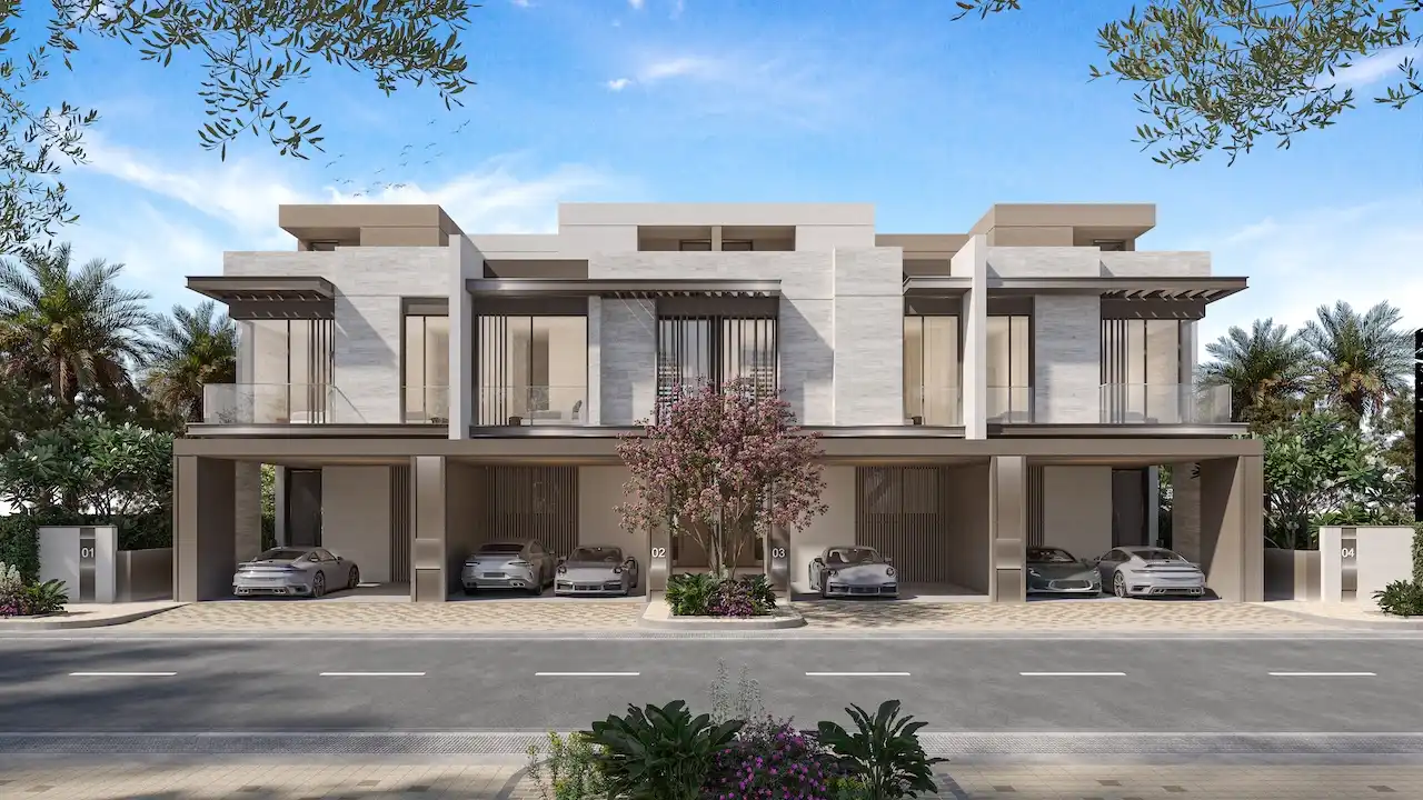 Three bedroom townhouse street facade at Nad Al Sheba Gardens Phase 11 with private covered parking and contemporary exterior design Presented by Tohid Fetrat