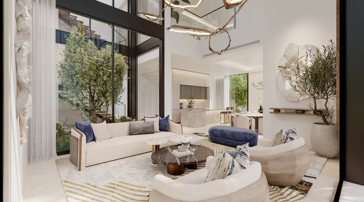 Open living area of a four bedroom villa at Nad Al Sheba Gardens Phase 11 with contemporary interiors, designer furniture and floor to ceiling windows Presented by Tohid Fetrat