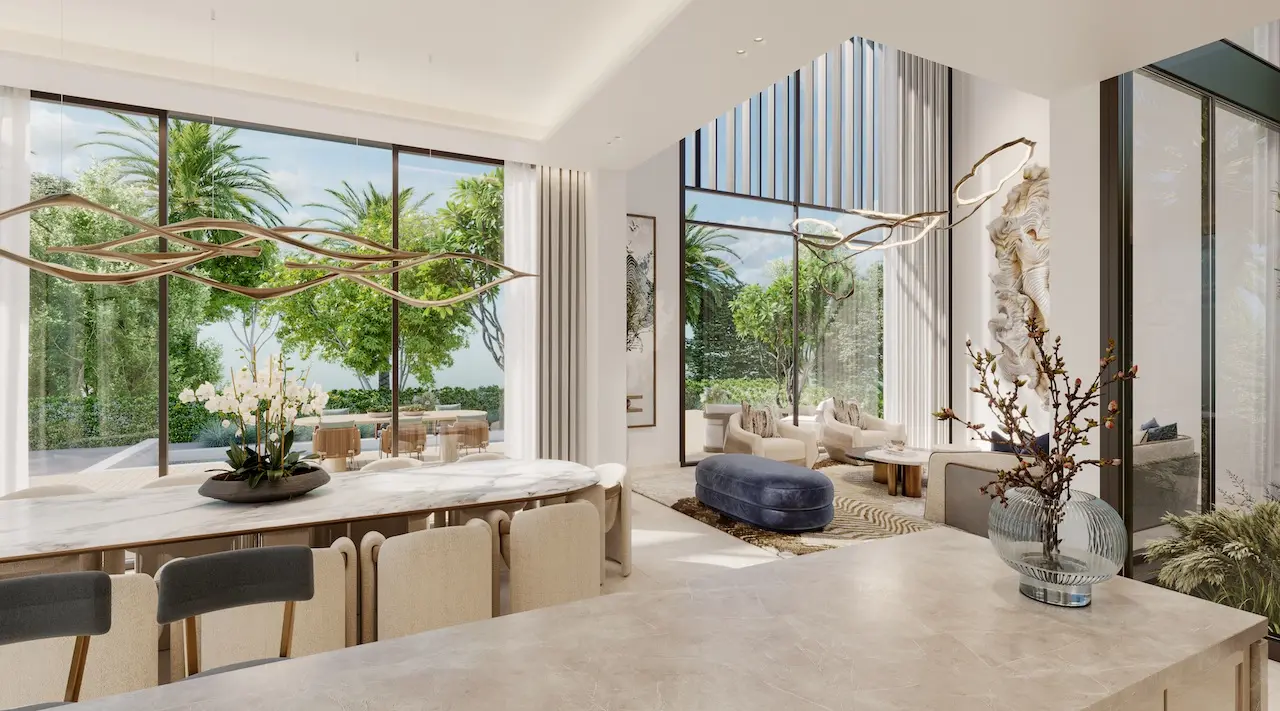 Living room interior of a four bedroom villa at Nad Al Sheba Gardens Phase 11 with open layout, modern furniture and garden view Presented by Tohid Fetrat