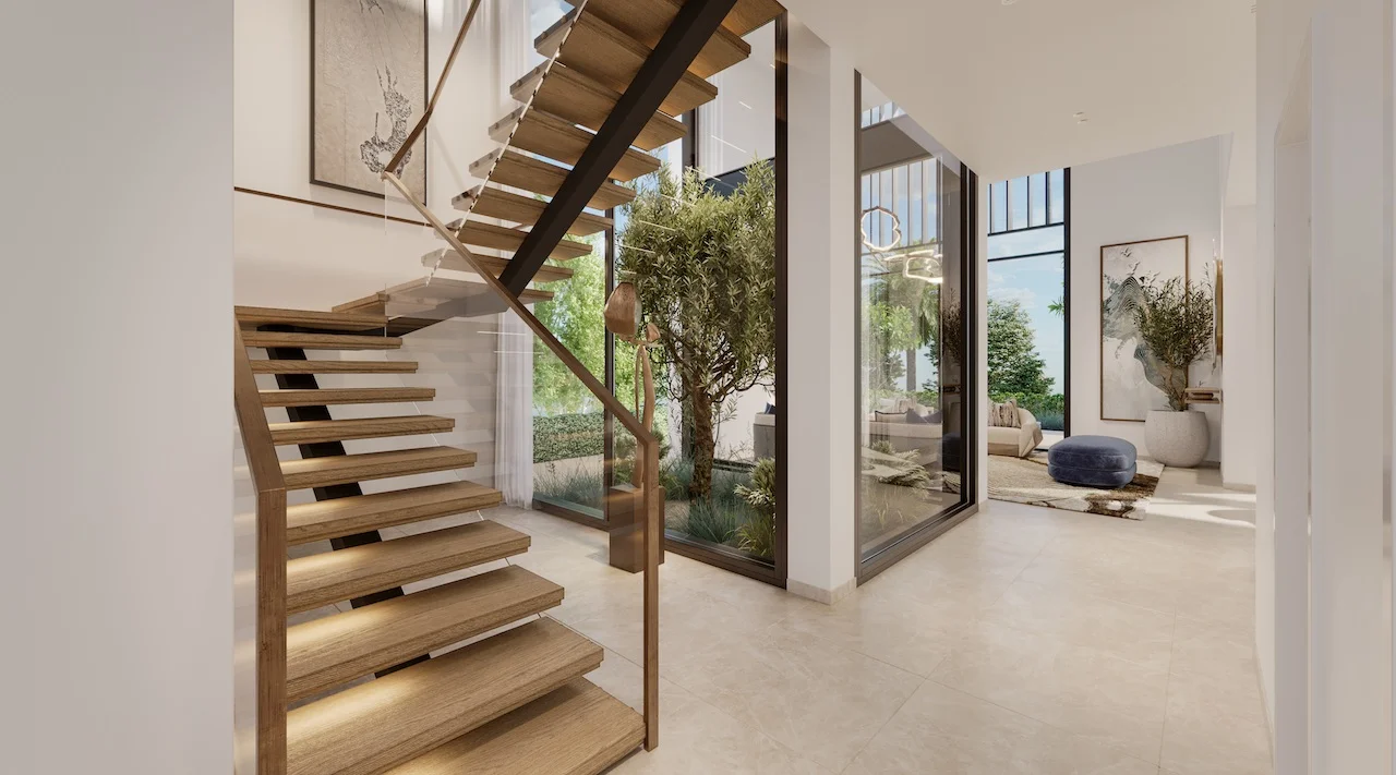 Interior staircase and corridor of a four bedroom villa at Nad Al Sheba Gardens Phase 11 with modern wooden steps, glass railing and natural daylight Presented by Tohid Fetrat
