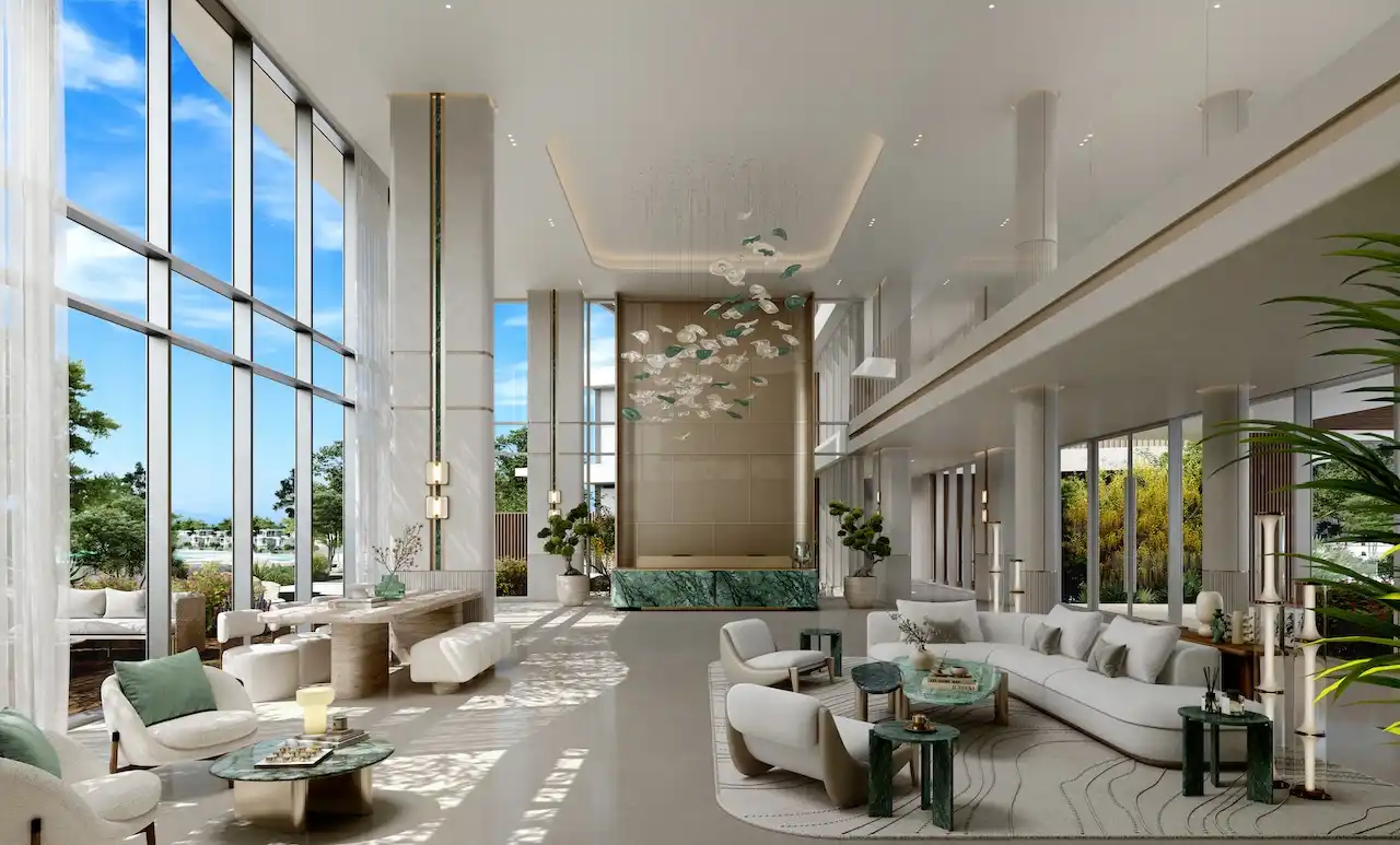 Palm Central Frond M Residences at Palm Jebel Ali grand lobby lounge with double height ceiling and luxury seating Dubai - Presented by Tohid Fetrat