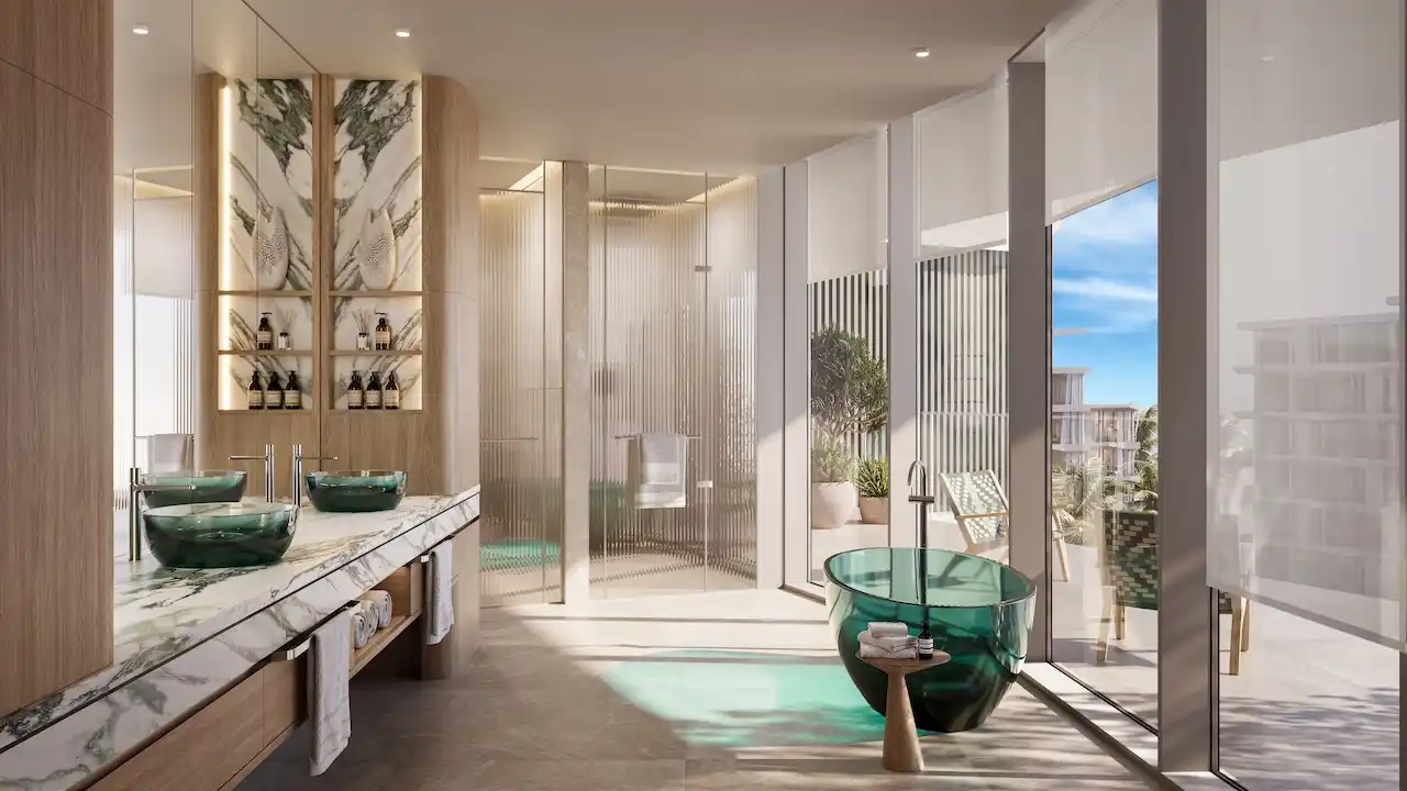 Palm Central Frond M Residences luxury bathroom interior with freestanding bathtub and waterfront view at Palm Jebel Ali Dubai - Presented by Tohid Fetrat