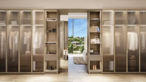 Palm Central Frond M Residences luxury walk in wardrobe with designer storage and garden view at Palm Jebel Ali Dubai - Presented by Tohid Fetrat