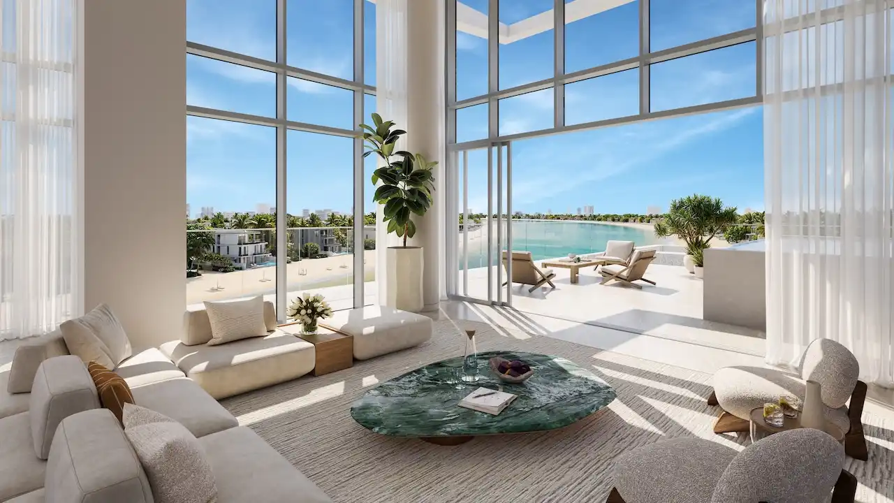 Palm Central Frond M Residences waterfront living room with terrace and panoramic lagoon views at Palm Jebel Ali Dubai - Presented by Tohid Fetrat