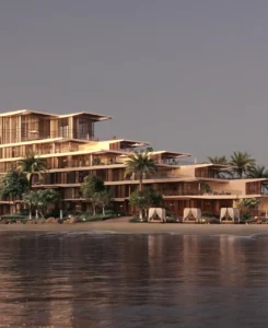 Palm Central Frond M Residences beachfront architecture at sunset overlooking waterfront shoreline in Palm Jebel Ali Dubai - Presented by Tohid Fetrat