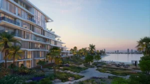 Waterfront residential buildings and landscaped promenade at Palm Central Frond M Residences in Palm Jebel Ali Dubai during sunset - Presented by Tohid Fetrat