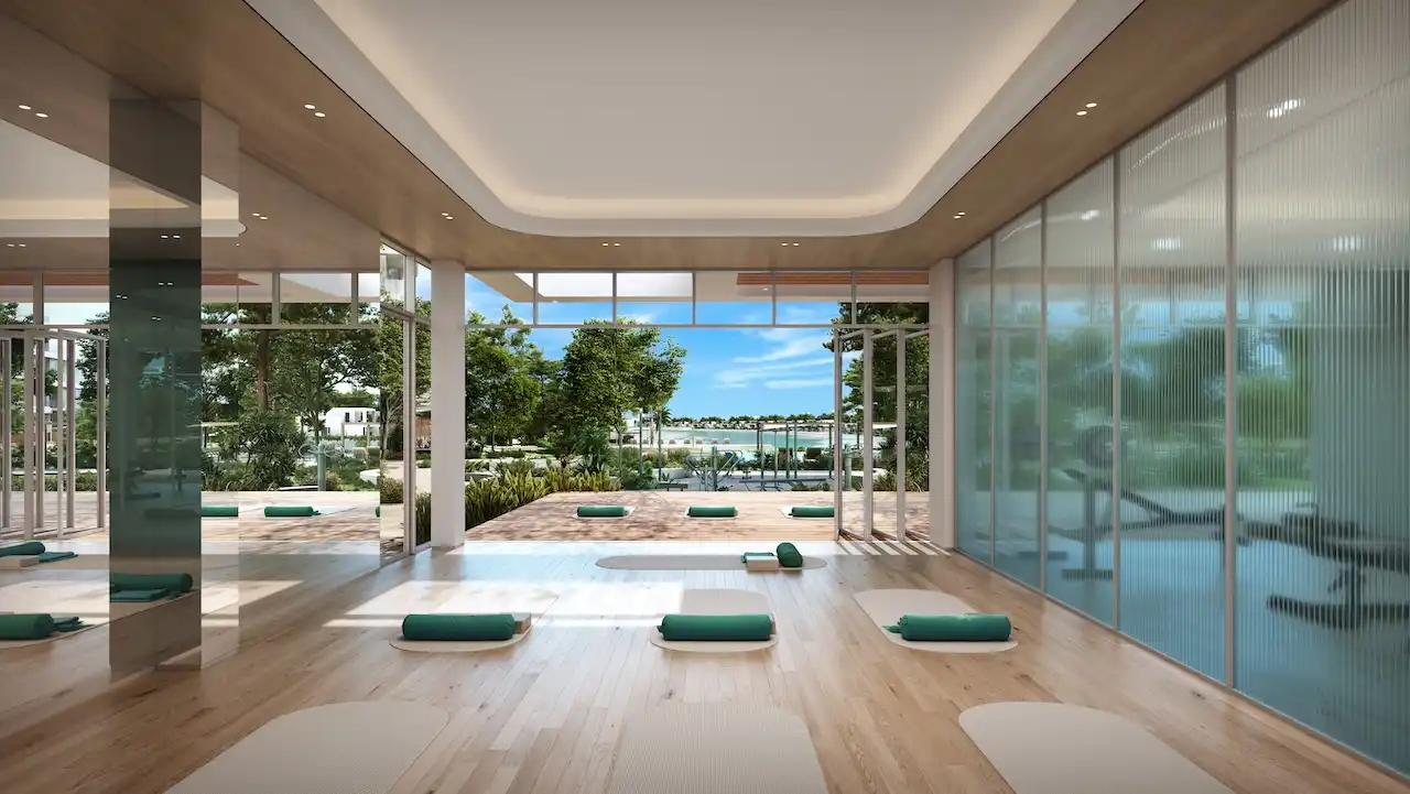 Yoga and wellness studio at Palm Central Frond M Residences overlooking landscaped waterfront surroundings in Palm Jebel Ali Dubai - Presented by Tohid Fetrat