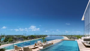Palm Central at Palm Jebel Ali infinity pool terrace with panoramic waterfront lagoon view and modern residences Dubai Presented by Tohid Fetrat