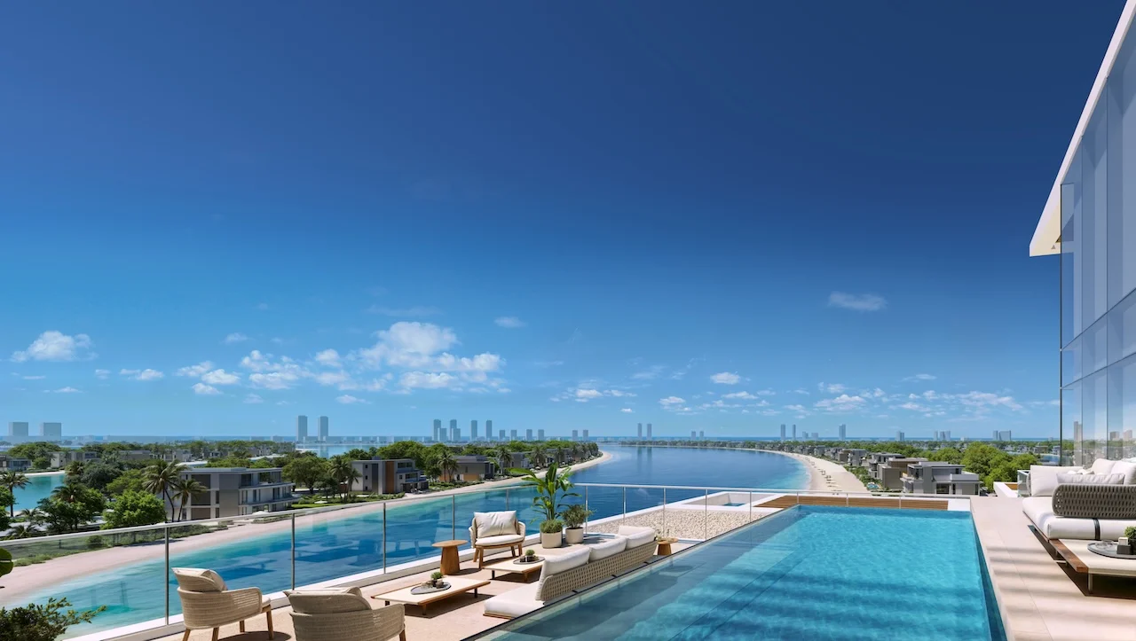 Palm Central at Palm Jebel Ali infinity pool terrace with panoramic waterfront lagoon view and modern residences Dubai Presented by Tohid Fetrat
