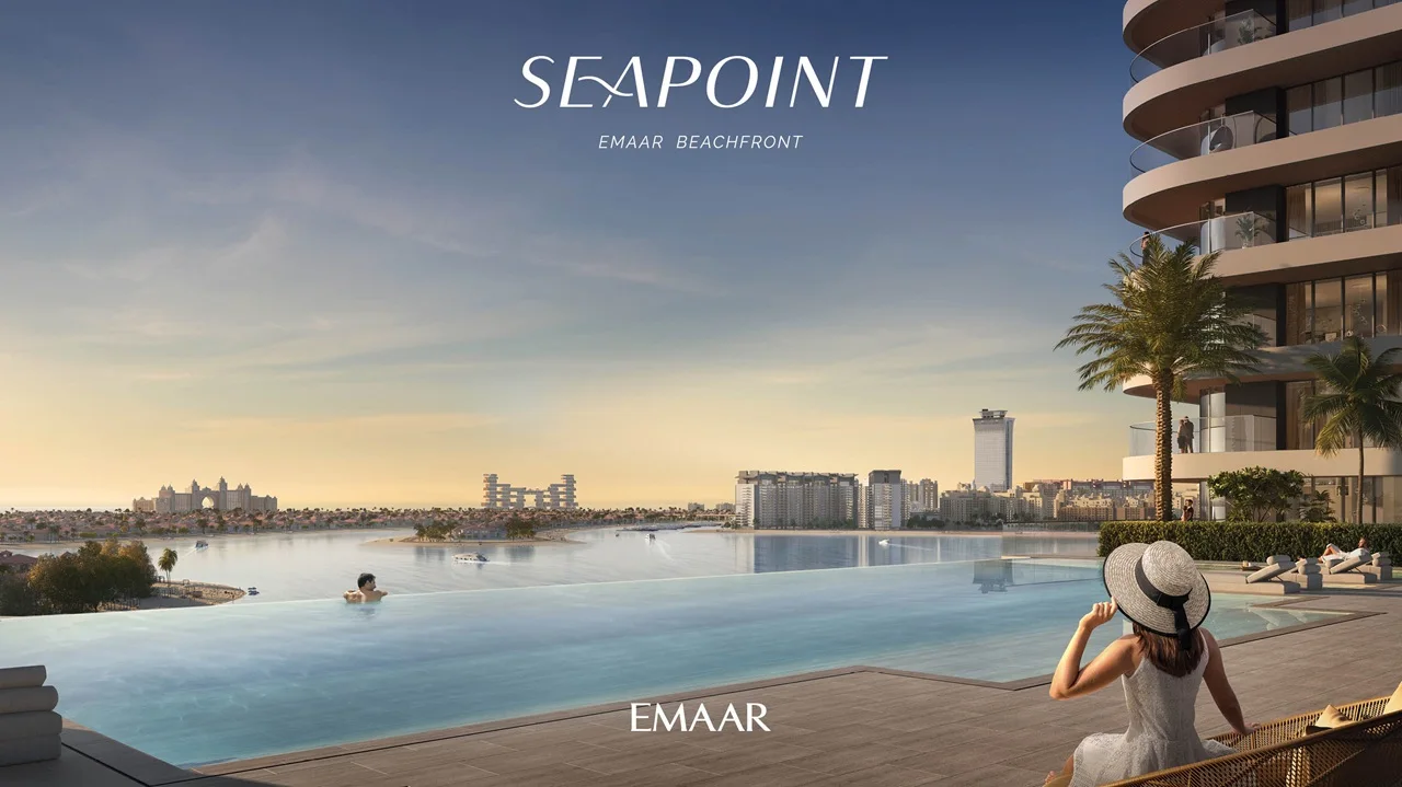 SeaPoint at Emaar Beachfront infinity pool overlooking waterfront skyline and luxury coastal community setting in Dubai Presented by Tohid Fetrat