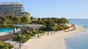 Beachfront scene at The Meriva Collection by Ellington showing Meriva Shores residences, landscaped promenade and Gulf coastline in Dubai Presented by Tohid Fetrat