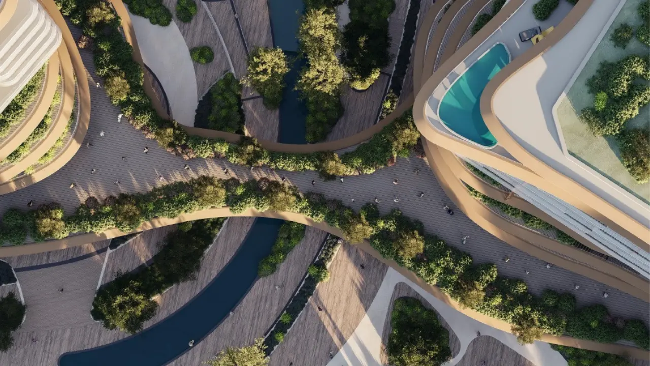 Top view of The Meriva Collection by Ellington showing landscaped promenade, water features and elevated pool terrace in Dubai Presented by Tohid Fetrat