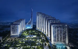 Blue hour aerial view of Vision Iconic at Mercedes Benz Places Binghatti City featuring illuminated towers landscaped podium gardens and central landmark tower in Dubai Presented by Tohid Fetrat