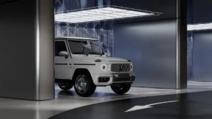 Premium branded parking area at Vision Iconic Mercedes Benz Places Binghatti City featuring Mercedes Benz G Class vehicle with futuristic lighting and luxury architectural design in Dubai Presented by Tohid Fetrat