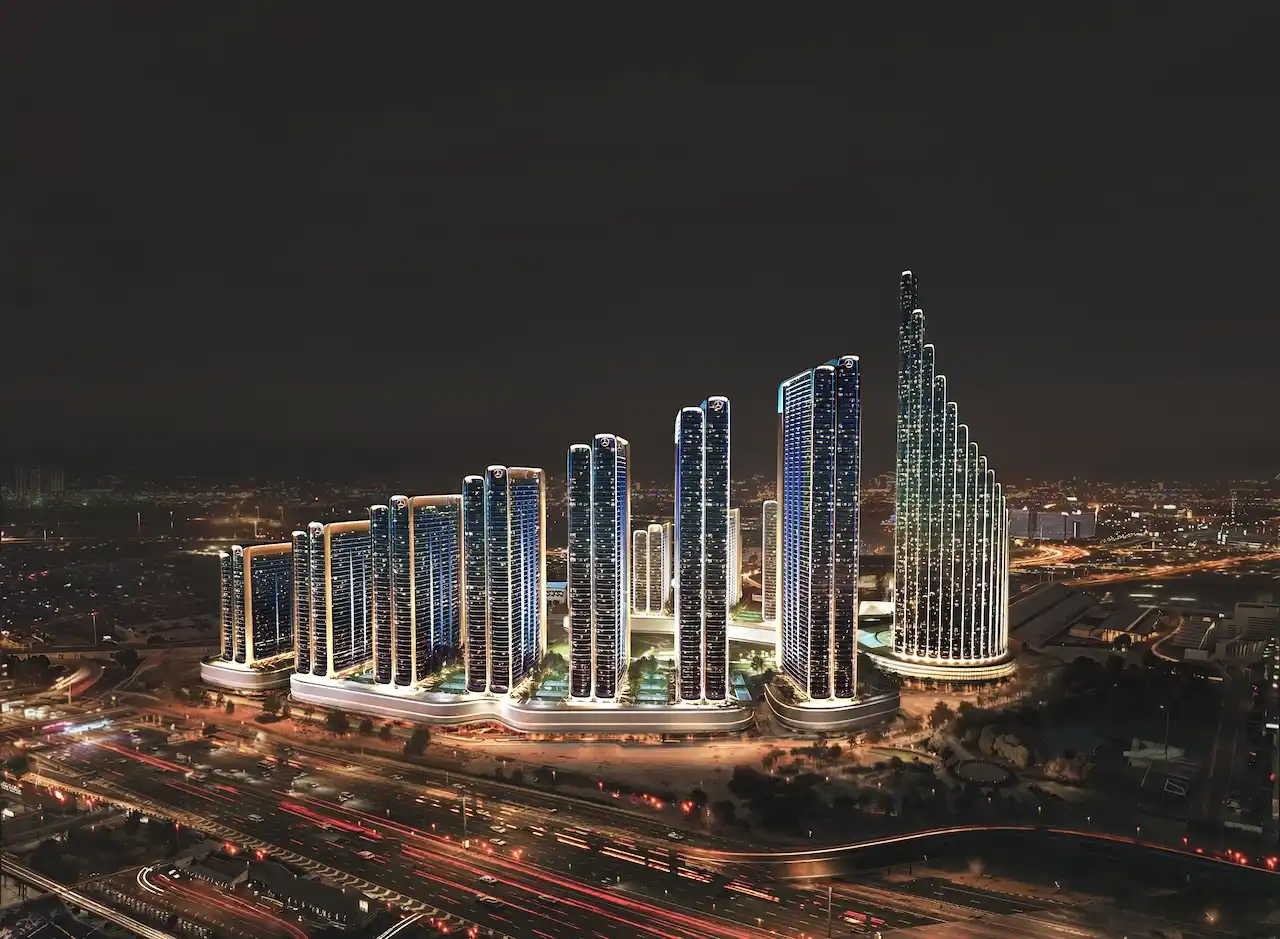 Night aerial view of Vision Iconic at Mercedes Benz Places Binghatti City showcasing illuminated residential towers and dynamic Dubai cityscape Presented by Tohid Fetrat