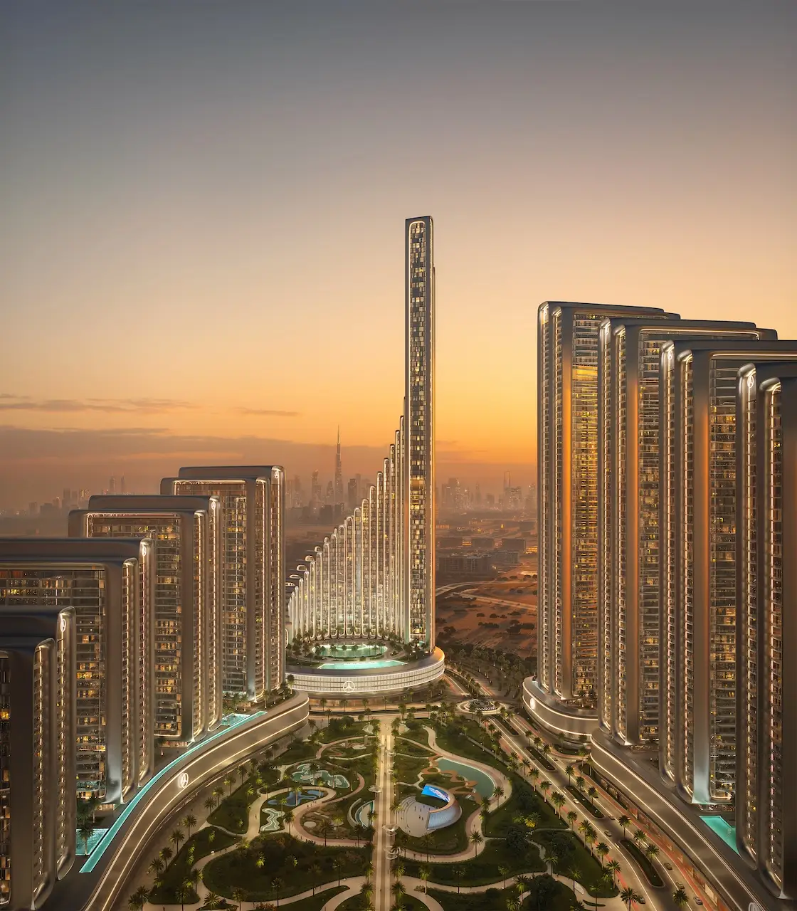 Sunset view of Vision Iconic at Mercedes Benz Places Binghatti City featuring central landmark tower landscaped gardens and illuminated residential buildings in Dubai Presented by Tohid Fetrat