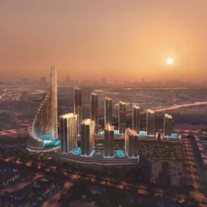 Sunset masterplan view of Vision Iconic at Mercedes Benz Places Binghatti City showing illuminated towers curved architectural layout and Dubai skyline horizon Presented by Tohid Fetrat